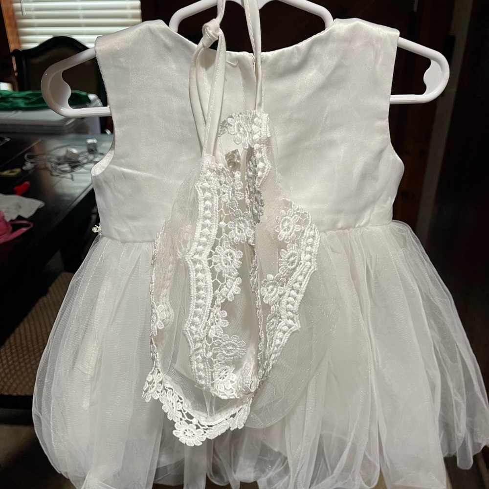 Baby’s christening dress with bonnet.